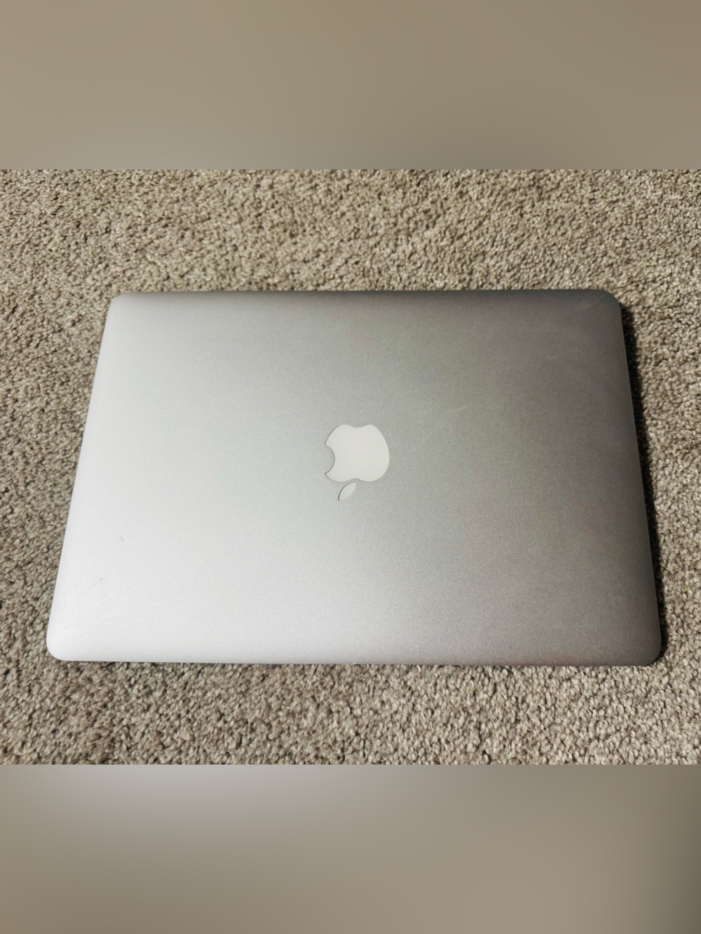 Apple Silver MacBook Laptop with Apple Logo